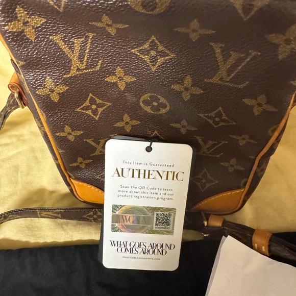 Louis Vuitton Brown Backpack with Iconic Monogram and Gold Hardware - Picture 4 of 8